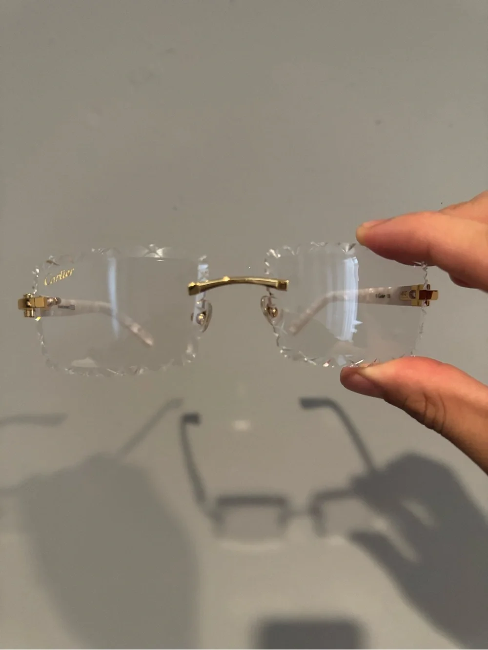 Cartier Clear Rimless Glasses with Gold Accents